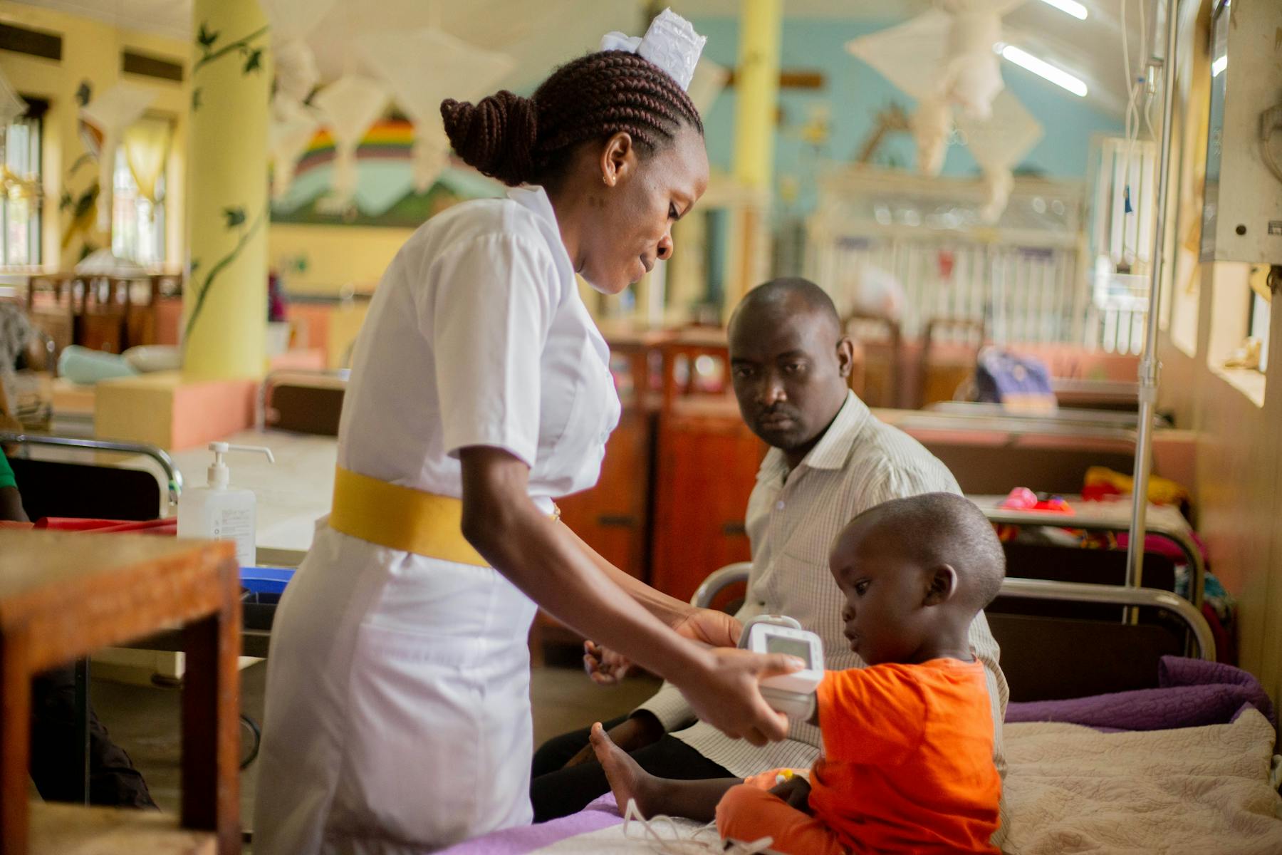 A nurse caring for a child